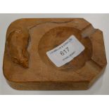 A CARVED WOODEN ASHTRAY IN THE STYLE OF THE MOUSEMAN, ROBERT THOMPSON