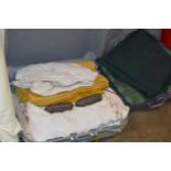 3 CASES WITH CUSHIONS, LINEN, CLOTHING, ROLL OF FABRIC ETC