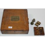 OLD OAK BOX WITH BRASS PLAQUE "COUNTY OF LANARK" WITH VARIOUS OLD WEIGHTS