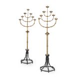 ENGLISH SCHOOLPAIR OF GOTHIC REVIVAL BRASS STANDING CANDELABRA, CIRCA 1880 each with six curved