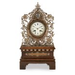 JOHN HARDMAN & CO., BIRMINGHAMGOTHIC REVIVAL SILVER PLATE MANTEL CLOCK, CIRCA 1860 the circular