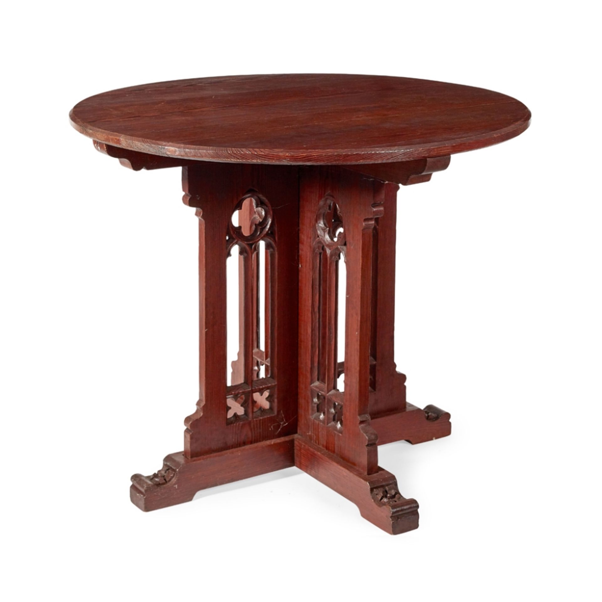 ENGLISH SCHOOLGOTHIC REVIVAL PITCH PINE CENTRE TABLE, CIRCA 1860 the chamfered cut circular top