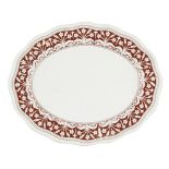 OWEN JONES (1809-1874)EARTHENWARE SERVING PLATE, CIRCA 1870 of shaped oval form, decorated with a