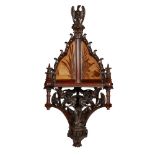 MANNER OF JOHN HENRY CHAMBERLAINAESTHETIC MOVEMENT CARVED MAHOGANY CORNER WALL BRACKET, CIRCA 1870