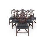 SET OF SIX 'HEPPLEWHITE' MAHOGANY DINING CHAIRS19TH CENTURY the shield-shaped backs with pierced and