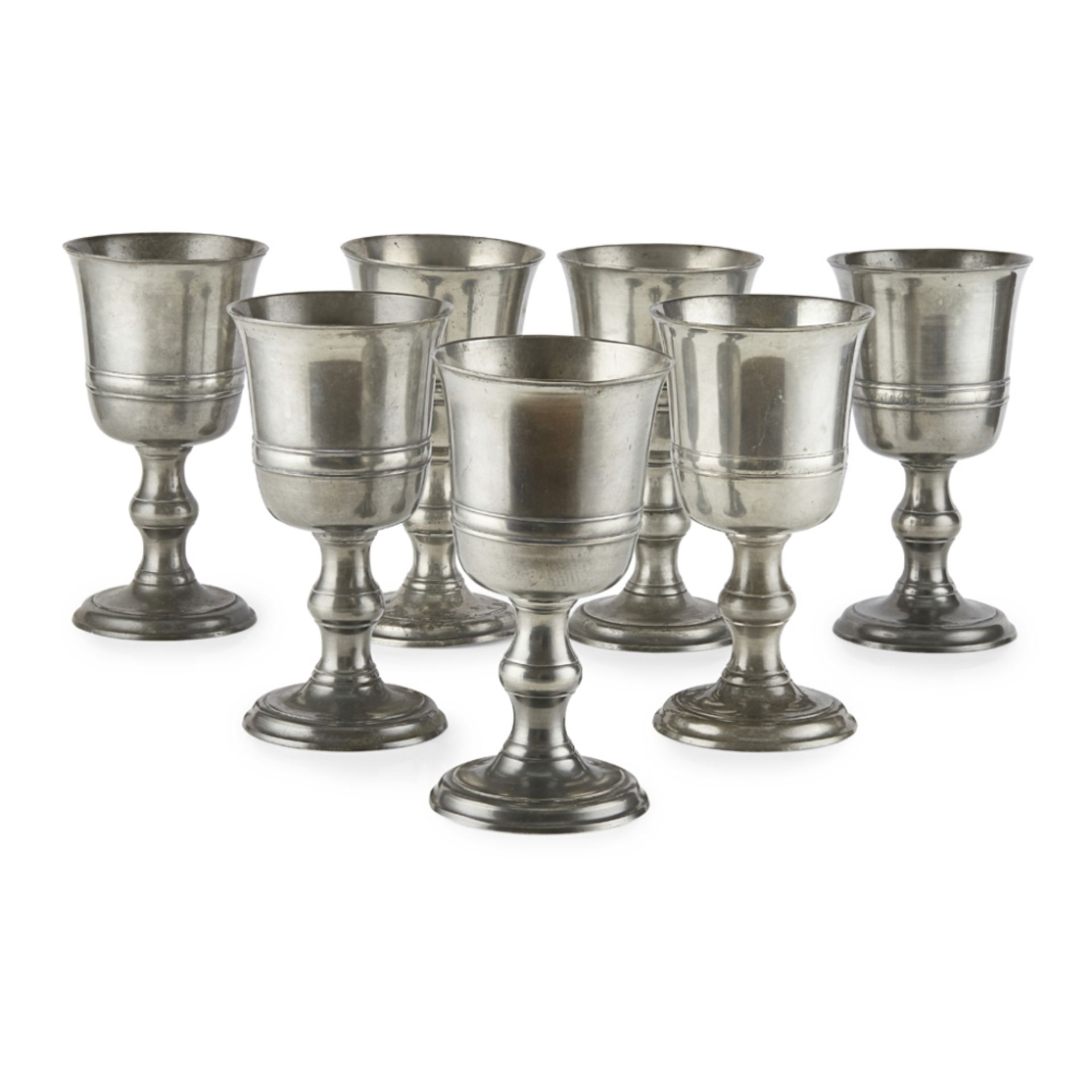 SET OF SEVEN LARGE SCOTTISH PEWTER COMMUNION CHALICES, BY WILLIAM SCOTTLATE 18TH/ EARLY 19TH CENTURY