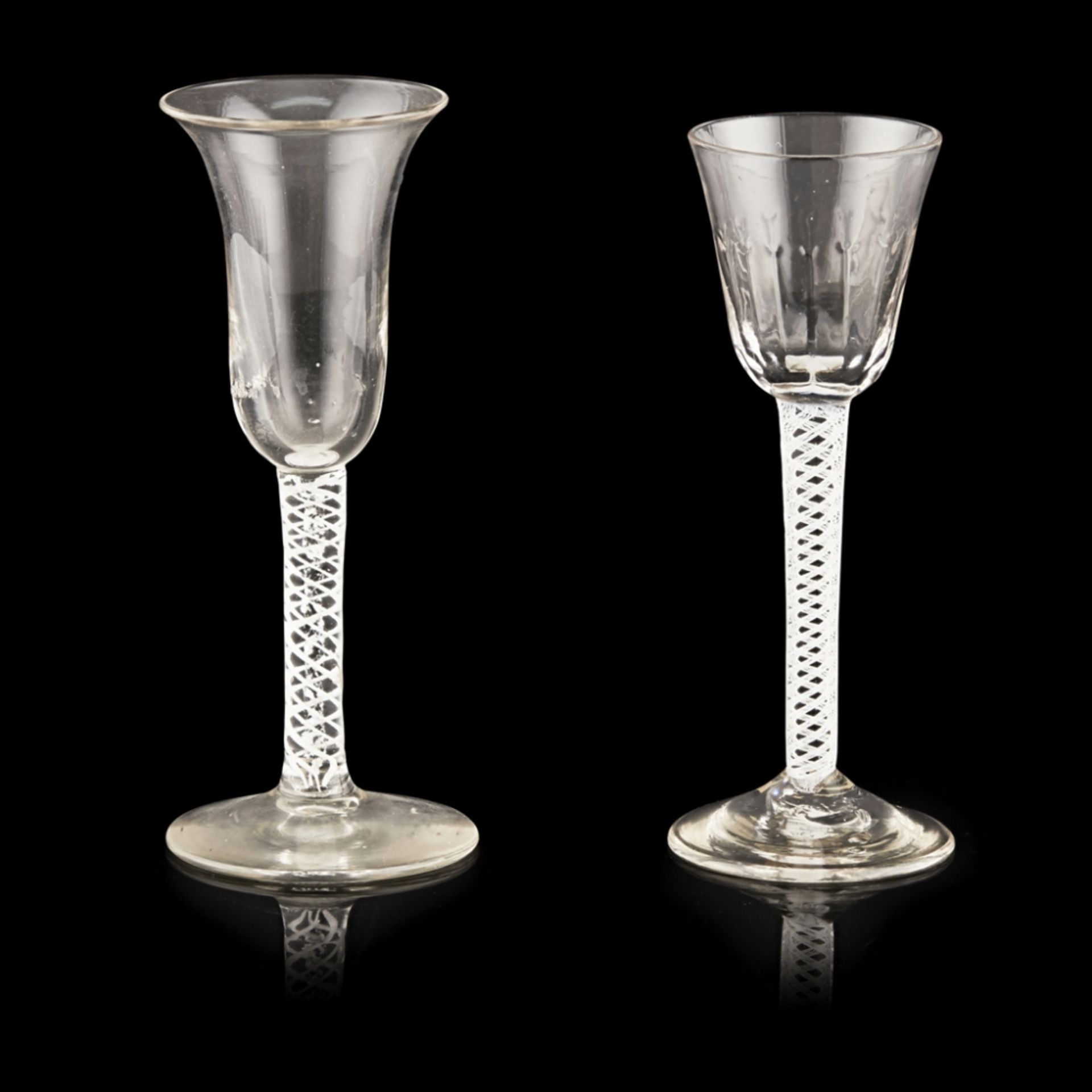 FOUR GEORGIAN TWIST STEM WINE GLASSESMID-18TH CENTURY comprising a bell bowled glass with a mixed - Image 2 of 3