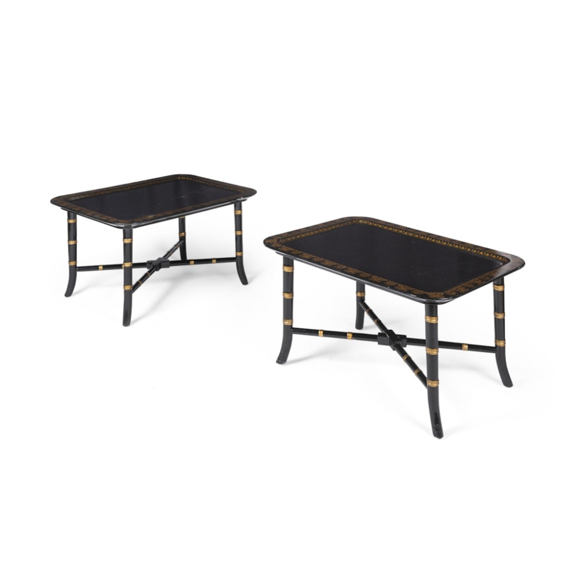 PAIR BLACK LACQUER AND PARCEL GILT LOW TABLESMODERN the rounded rectangular tray tops with gilt