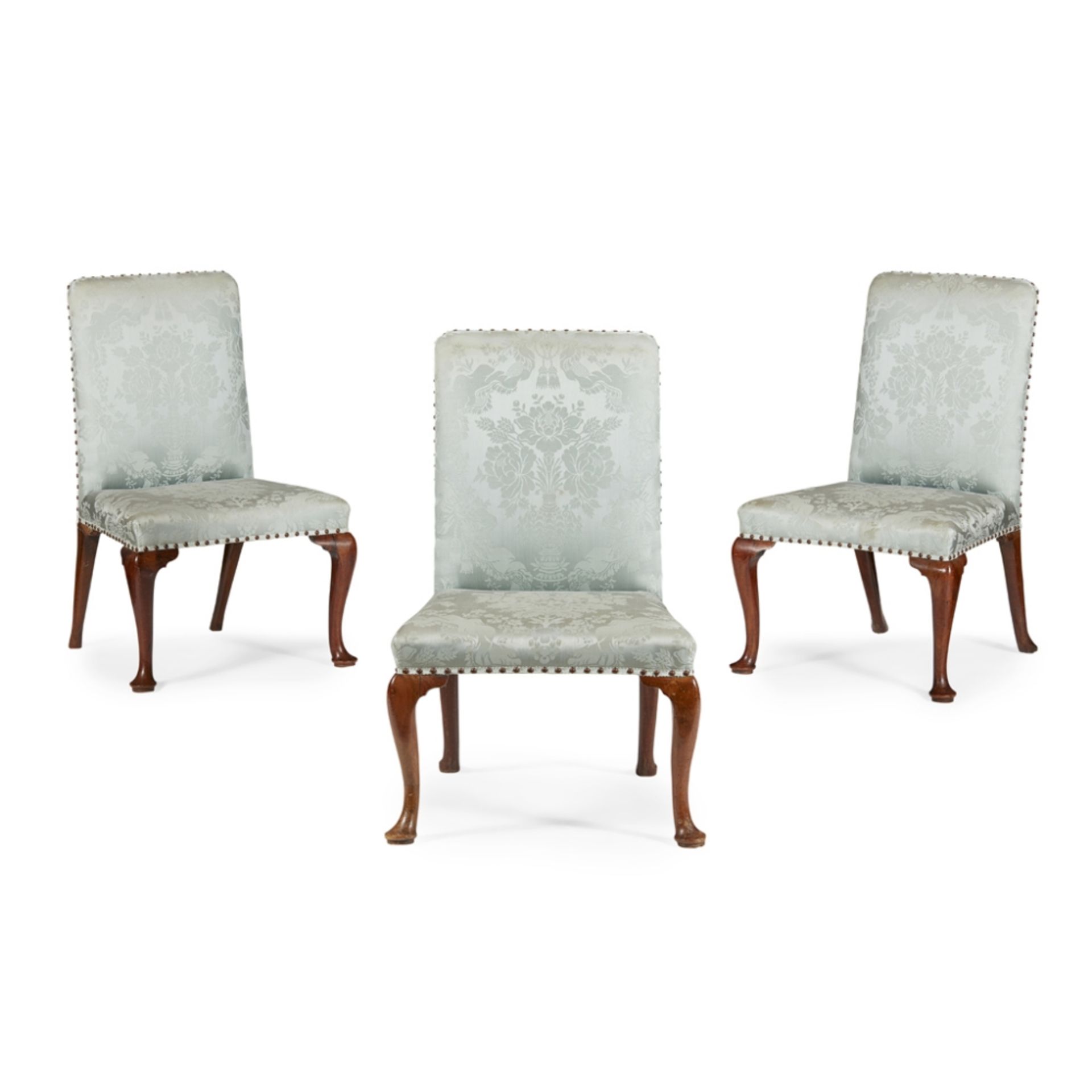 THREE GEORGE II UPHOLSTERED SIDE CHAIRSEARLY 18TH CENTURY the rectangular backs and wide seats in