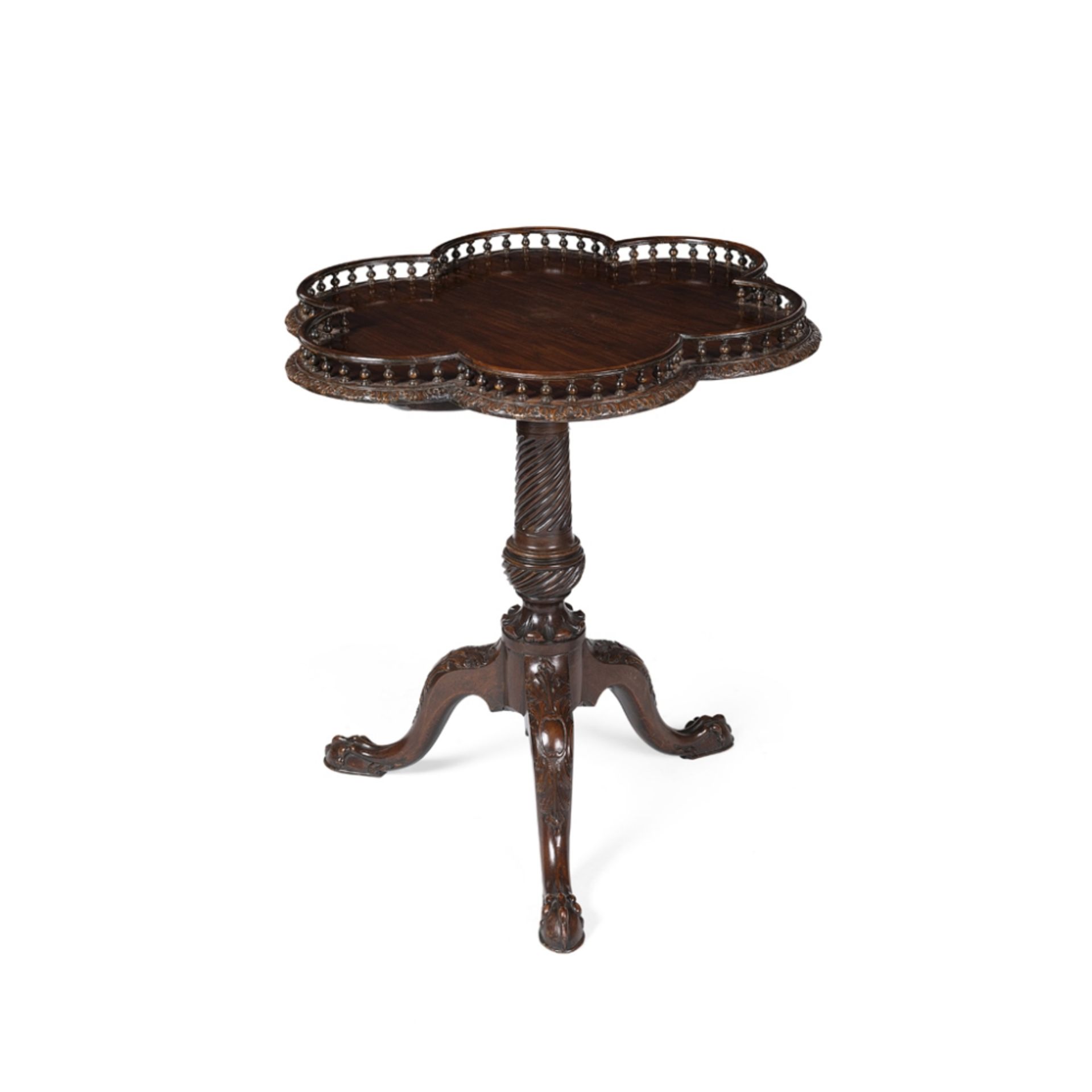 GEORGIAN STYLE MAHOGANY TRIPOD TEA TABLE19TH CENTURY the lobed tilt top with a gallery rail, on a