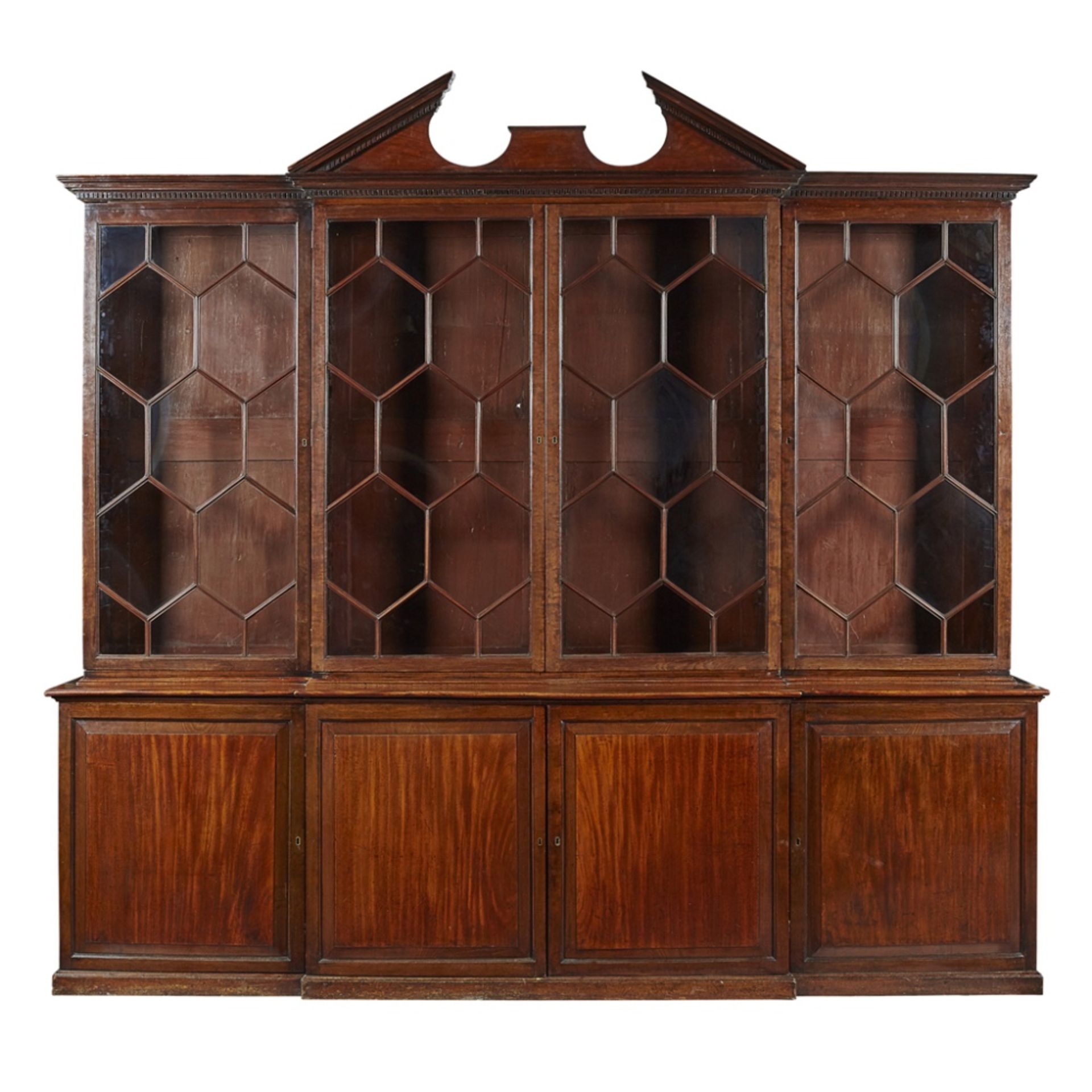 GEORGE III MAHOGANY BREAKFRONT LIBRARY BOOKCASE, AFTER A DESIGN BY THOMAS CHIPPENDALEMID 18TH