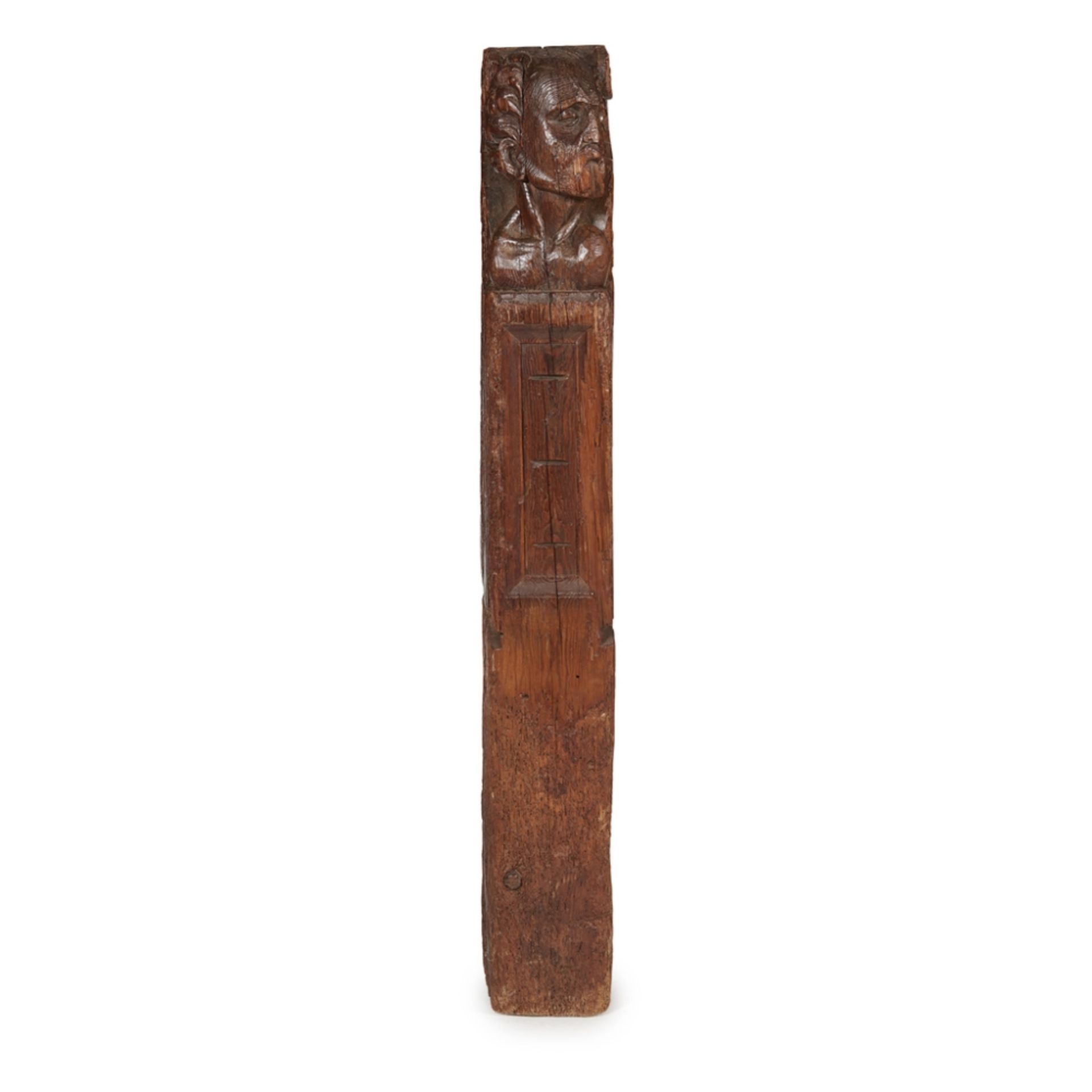 CARVED OAK ROOF BEAM16TH/17TH CENTURY the terminal carved with a man's head131cm high