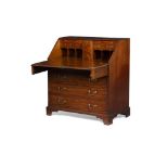 GEORGE III MAHOGANY BUREAU18TH CENTURY the slant front opening to an arrangement of pigeon holes and