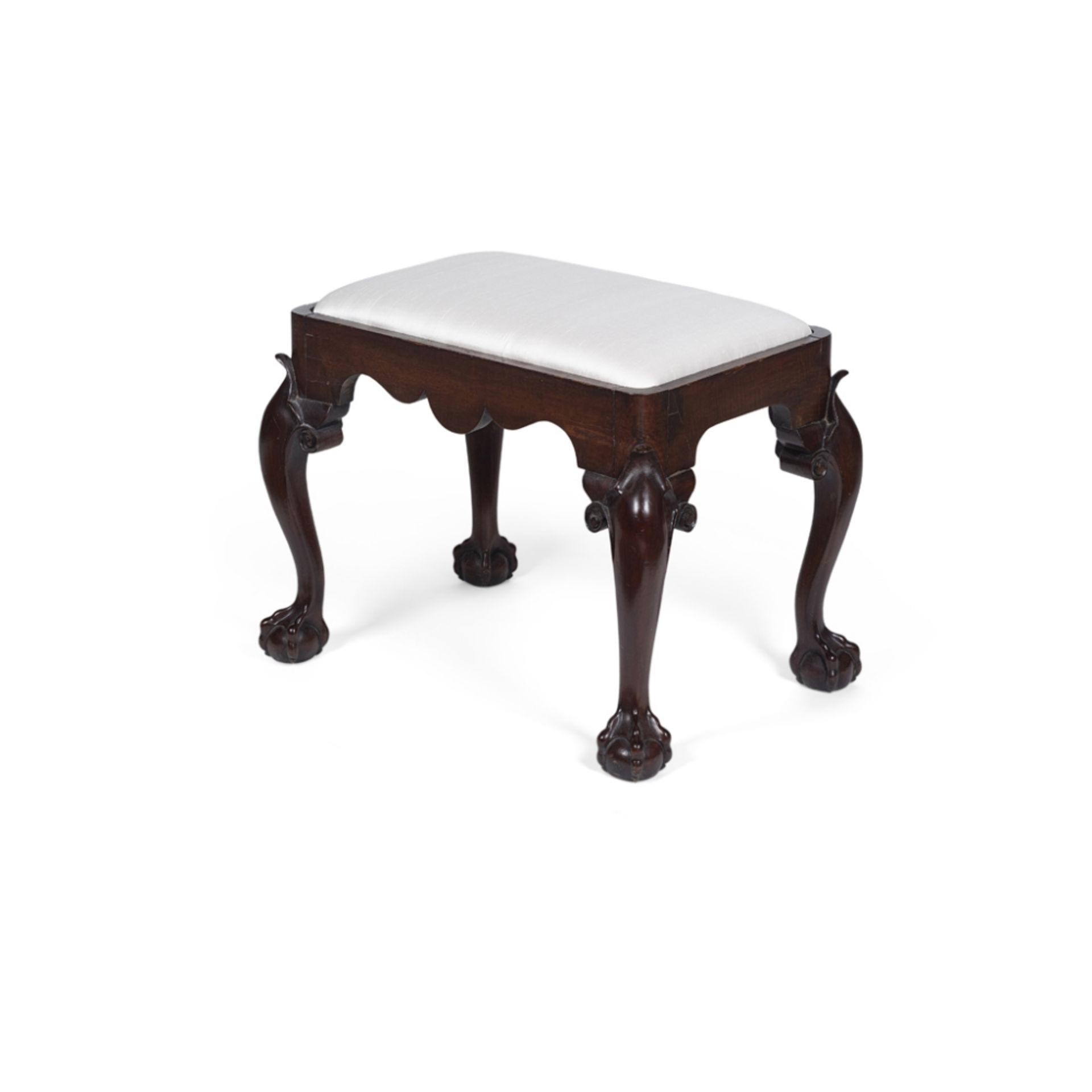 LATE GEORGE II MAHOGANY STOOLMID-18TH CENTURY the drop-in seat covered in white silk, above a shaped