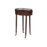 ENGLISH ROSEWOOD OCCASIONAL TABLE19TH CENTURY with a spindle gallery enclosing a serpentine