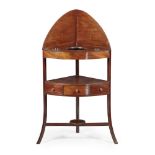 GEORGE III MAHOGANY CORNER WASH STAND18TH CENTURY the arched backsplash above a bowfront top with