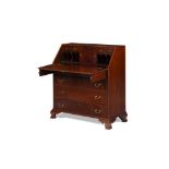GEORGE III RED WALNUT BUREAU18TH CENTURY the slant front opening to an arrangement of pigeon holes