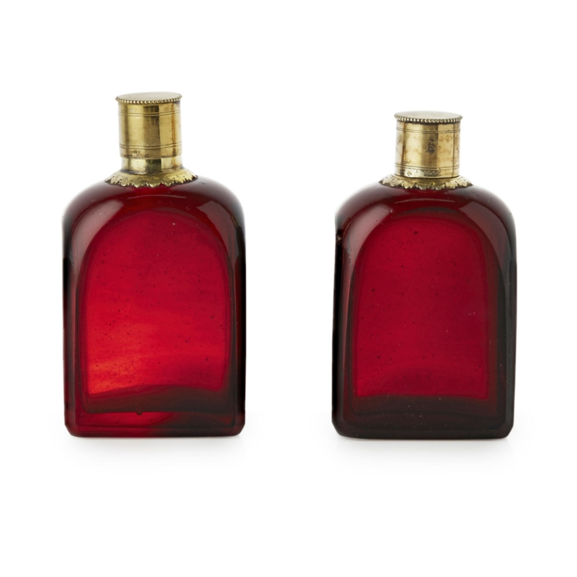 PAIR OF GERMAN RUBY GLASS BOTTLESEARLY 18TH CENTURY of shouldered rectangular form, the plain ruby