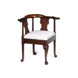 GEORGE II MAHOGANY CORNER ARMCHAIR2ND QUARTER 18TH CENTURY the curved backrail and arms over solid
