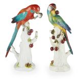 TWO MEISSEN PORCELAIN FIGURES OF PARROTS19TH CENTURY models 20 and 20X, perched on tree stumps