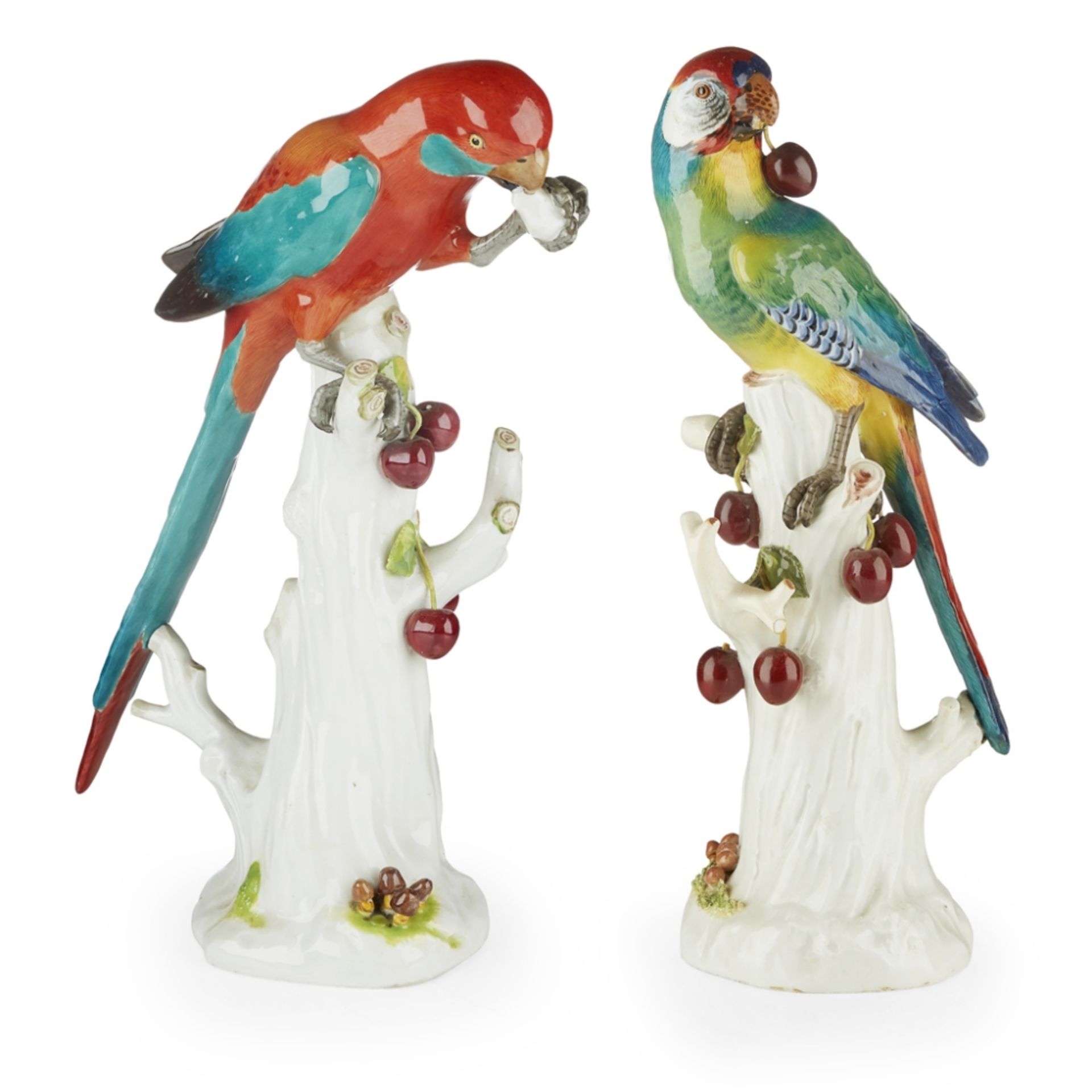 TWO MEISSEN PORCELAIN FIGURES OF PARROTS19TH CENTURY models 20 and 20X, perched on tree stumps