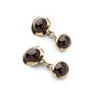 [§] INGEBORG BRATMAN (AUSTRIAN, 1935-2015)PAIR OF 9CT GOLD GARNET SET CUFFLINKS each terminal set