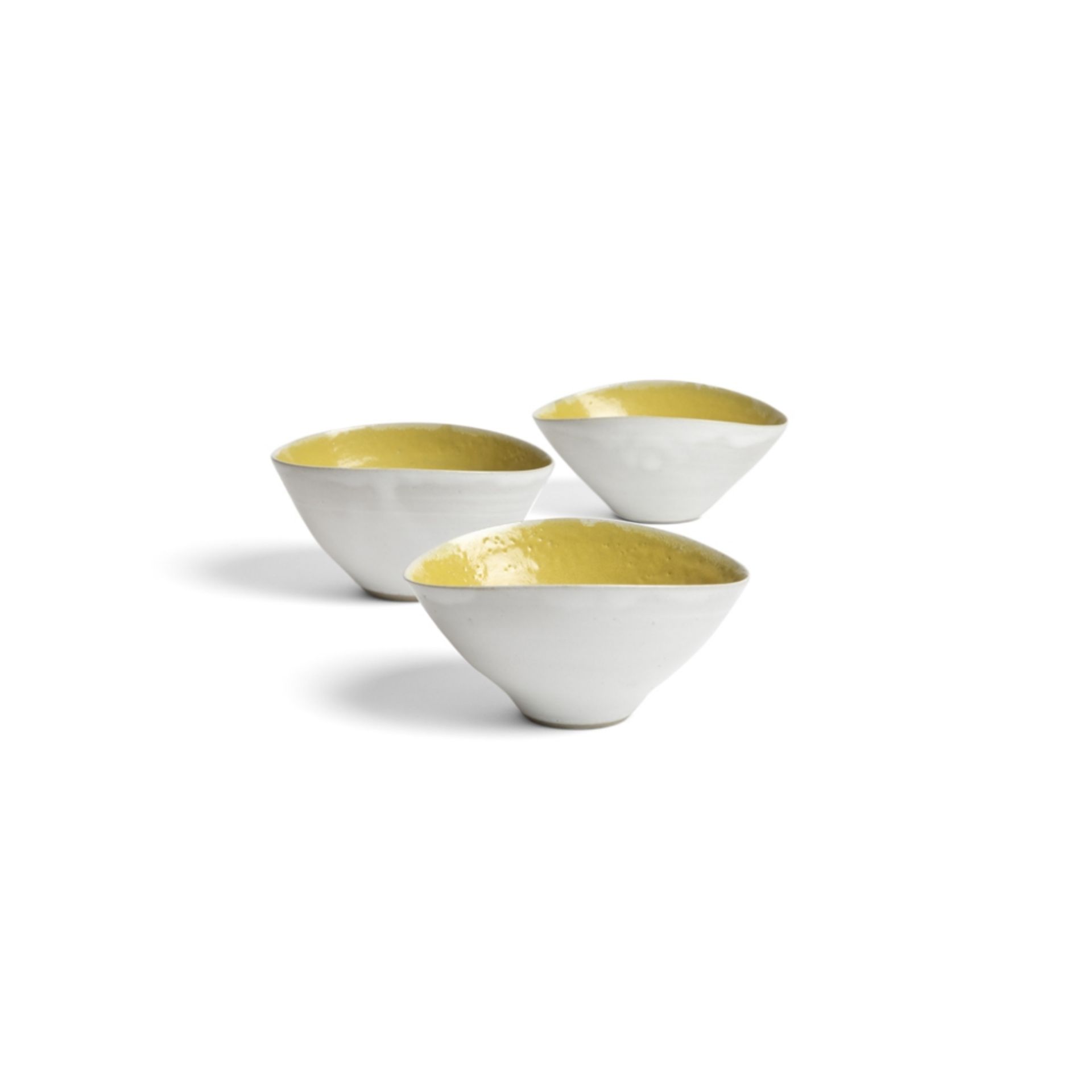 [§] LUCIE RIE D.B.E. (BRITISH, 1902-1995)SET OF THREE BOWLS each impressed artist's seal, white