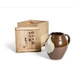 SHOJI HAMADA (JAPANESE, 1894-1978)JUG poured glaze design over kaki glaze, in signed wooden