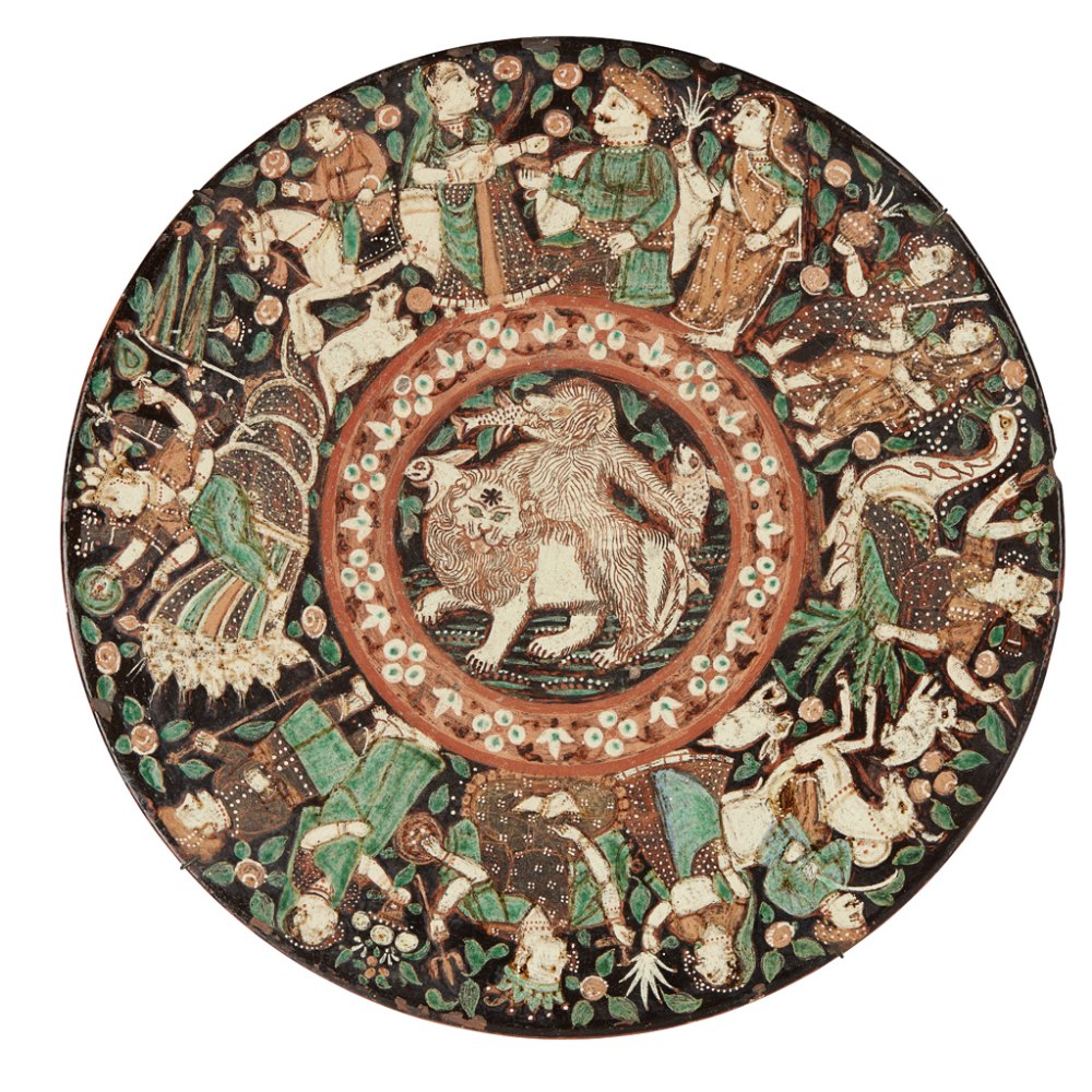BOMBAY SCHOOL OF ART WONDERLAND ART POTTERY WALL CHARGER, CIRCA 1880 painted with a central panel of