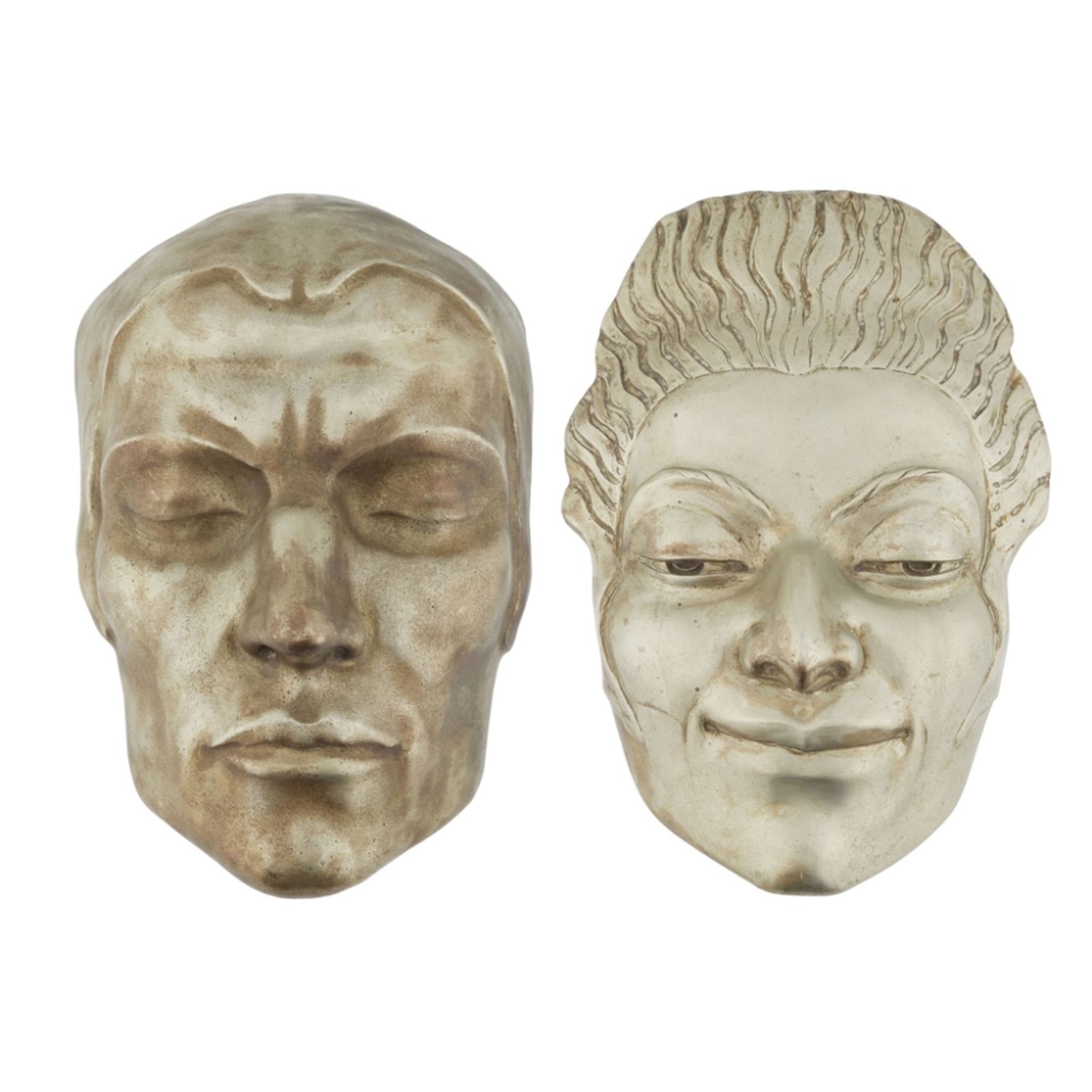 ENGLISH SCHOOL TWO ART DECO SILVERED WALL MASKS, CIRCA 1920 one depicting the head of a man, bears