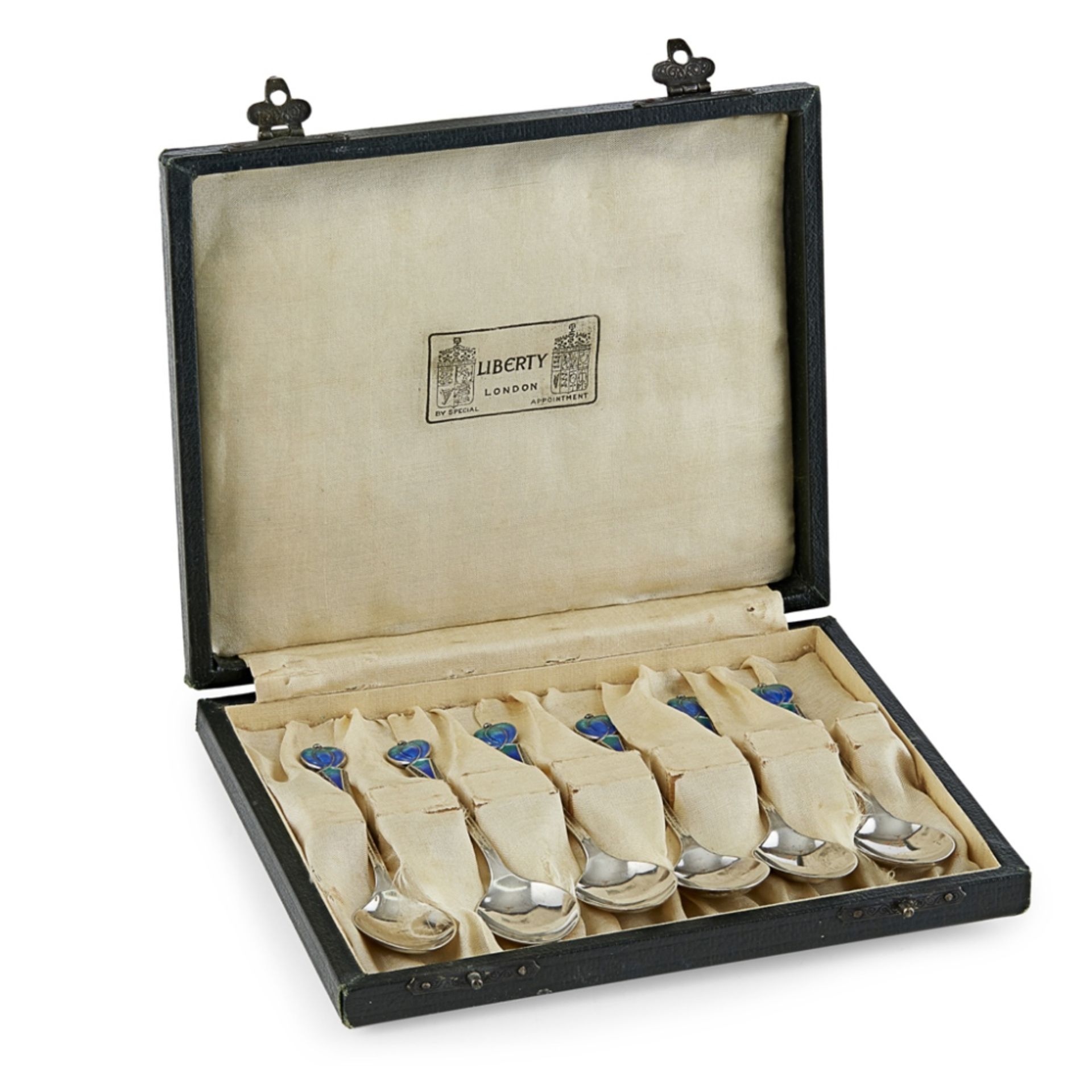 LIBERTY & CO., LONDON BOXED SET OF SIX SILVER AND ENAMEL TEASPOONS, 1933 with stylised green and