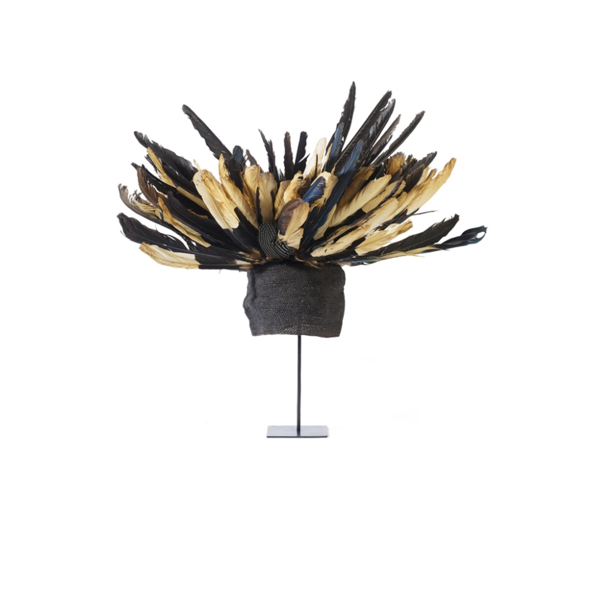 BAMILEKE FEATHER DANCE HATCAMEROON, 20TH CENTURY raffia mesh topped with dyed feathers, raised on