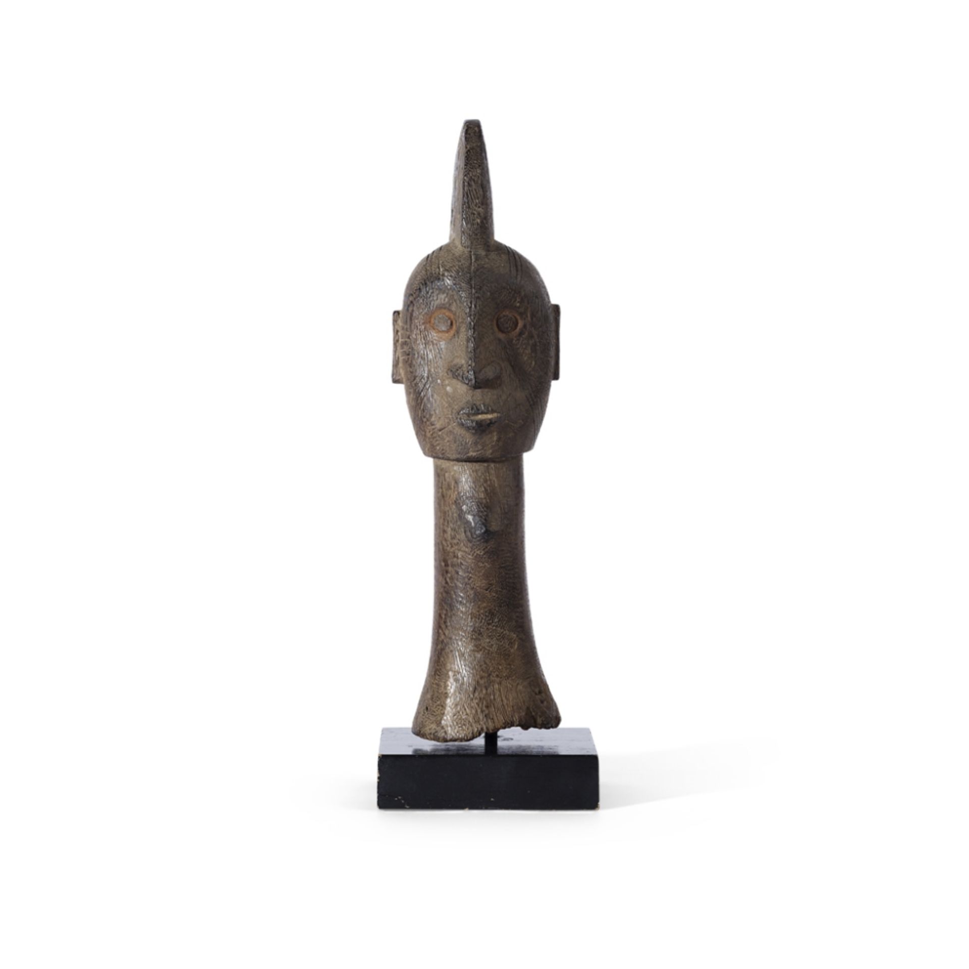 IGALA HEAD CRESTNIGERIA carved wood, a tall neck leading to the head with pursed lips, slender