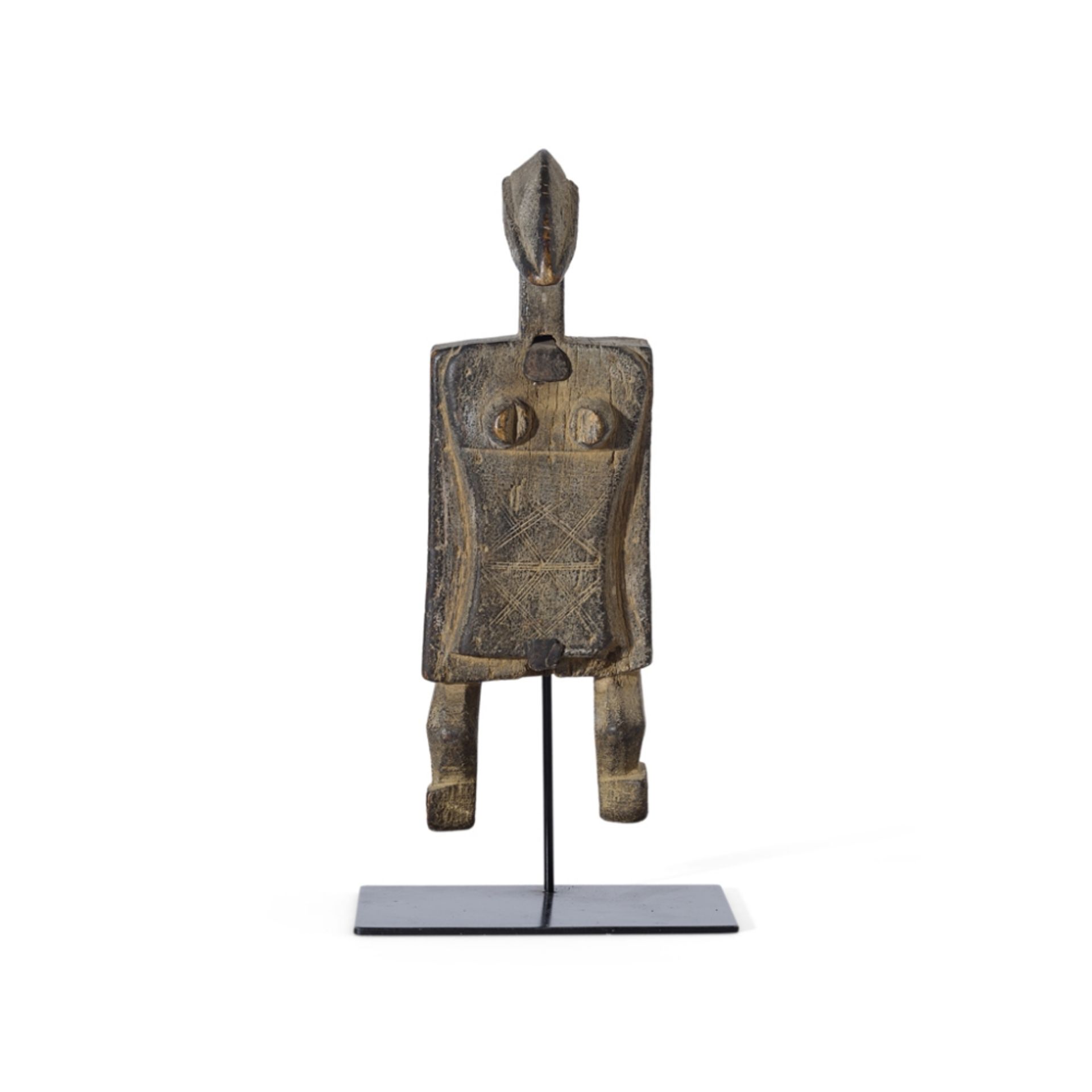DOGON LOCKMALI carved wood, upturned triangular head above a rectangular body with incised