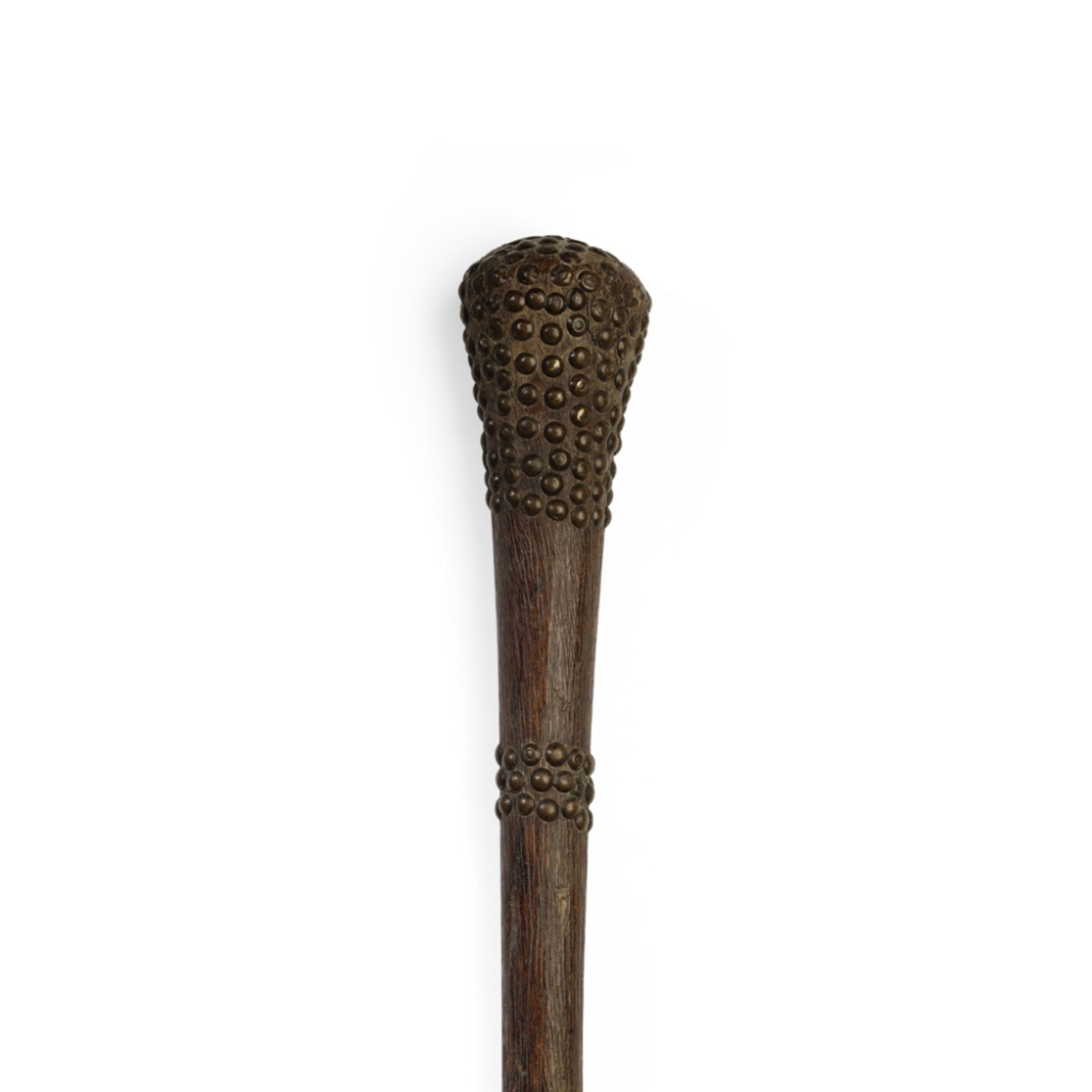 CHOKWE CLUBANGOLA carved wood and brass studs, the flaring head with multiple metal inserts, the