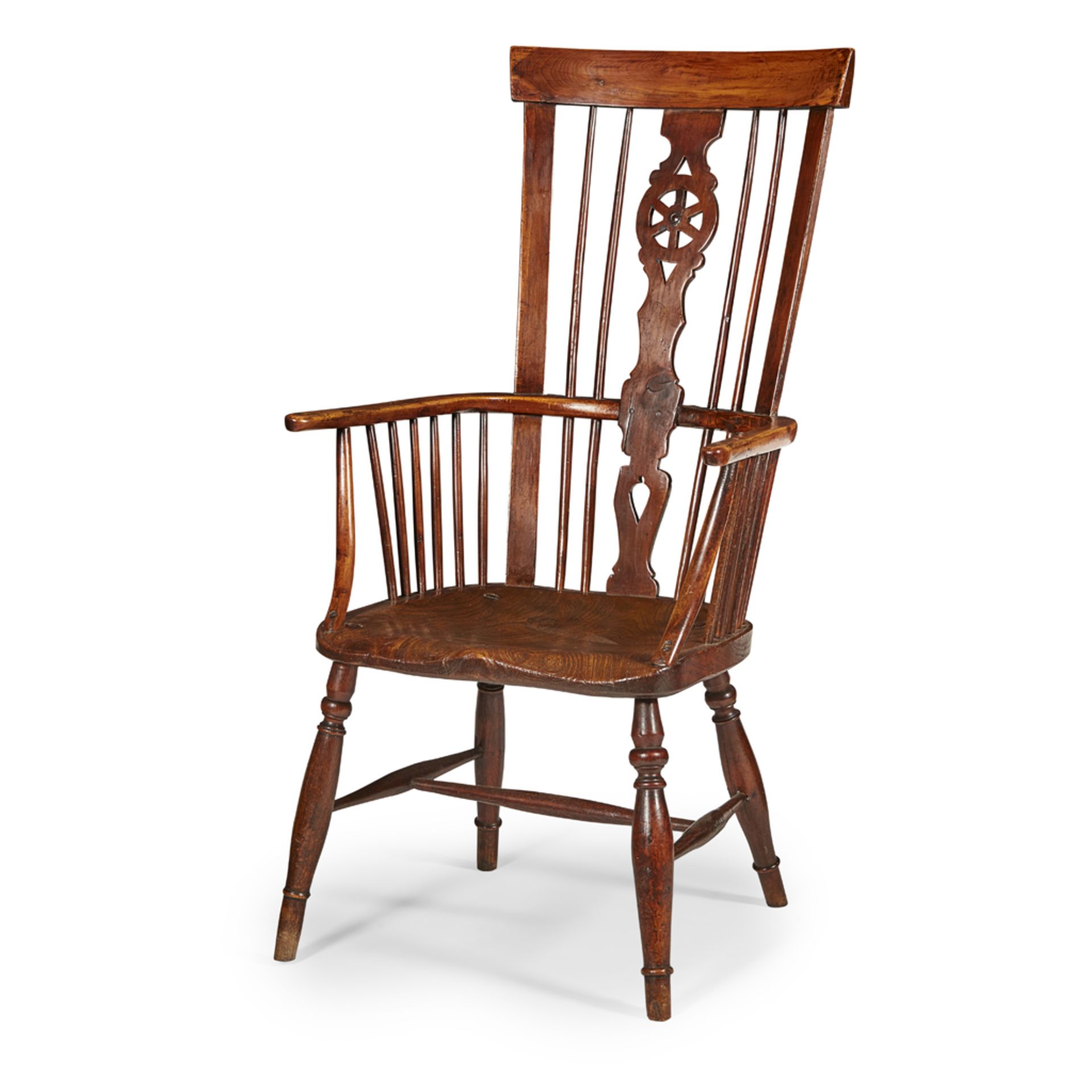 YEW AND ELM WINDSOR ARMCHAIR EARLY 19TH CENTURY the curved top rail above a pierced wheel splat