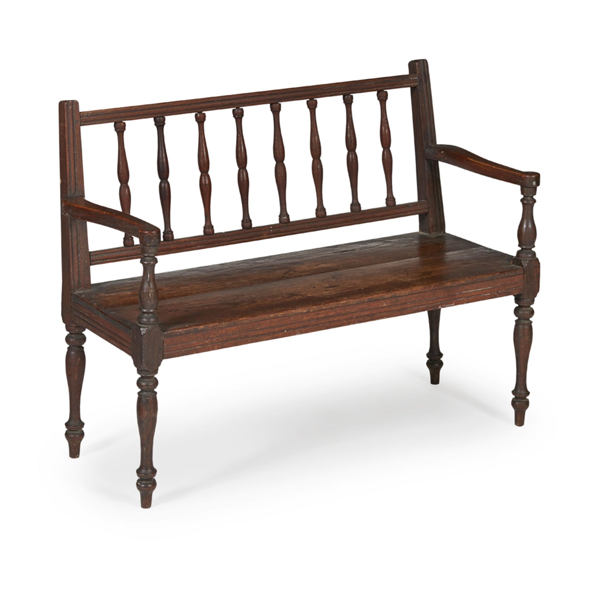 GEORGIAN OAK CHILD'S SETTLE 19TH CENTURY with a spindle back over a plank seat and scroll arms,