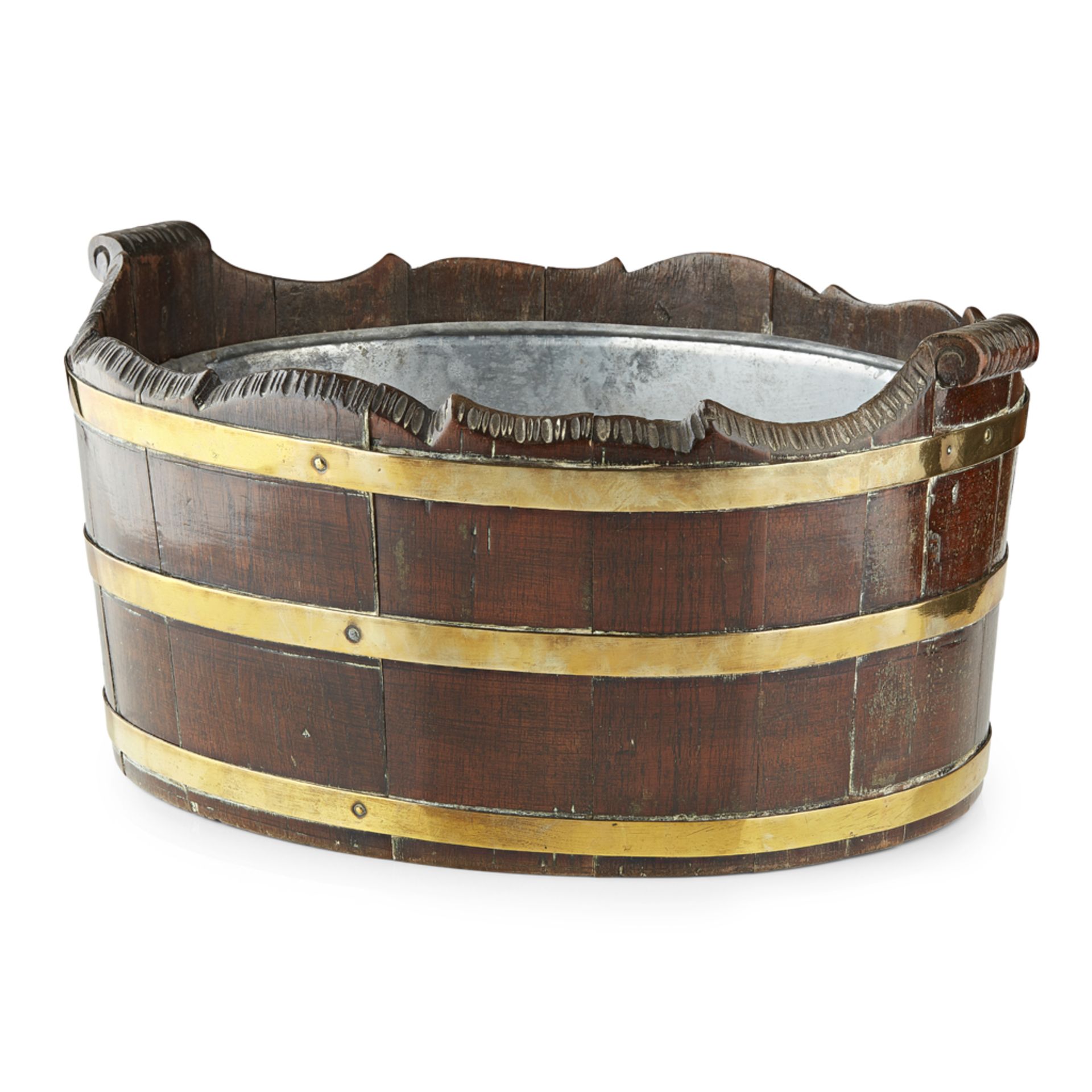 GEORGE III OAK BRASS BOUND OYSTER BUCKET 18TH CENTURY of oval form, with twin scrolled handles and