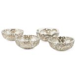 FOUR RETICULATED SILVER BOWLSTHREE WITH HONG HE AND HC MARKS, LATE QING DYNASTY three finely