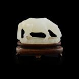 SMALL WHITE JADE CARVING OF A HORSEQING DYNASTY, 18TH/19TH CENTURY carved standing on a thin base of