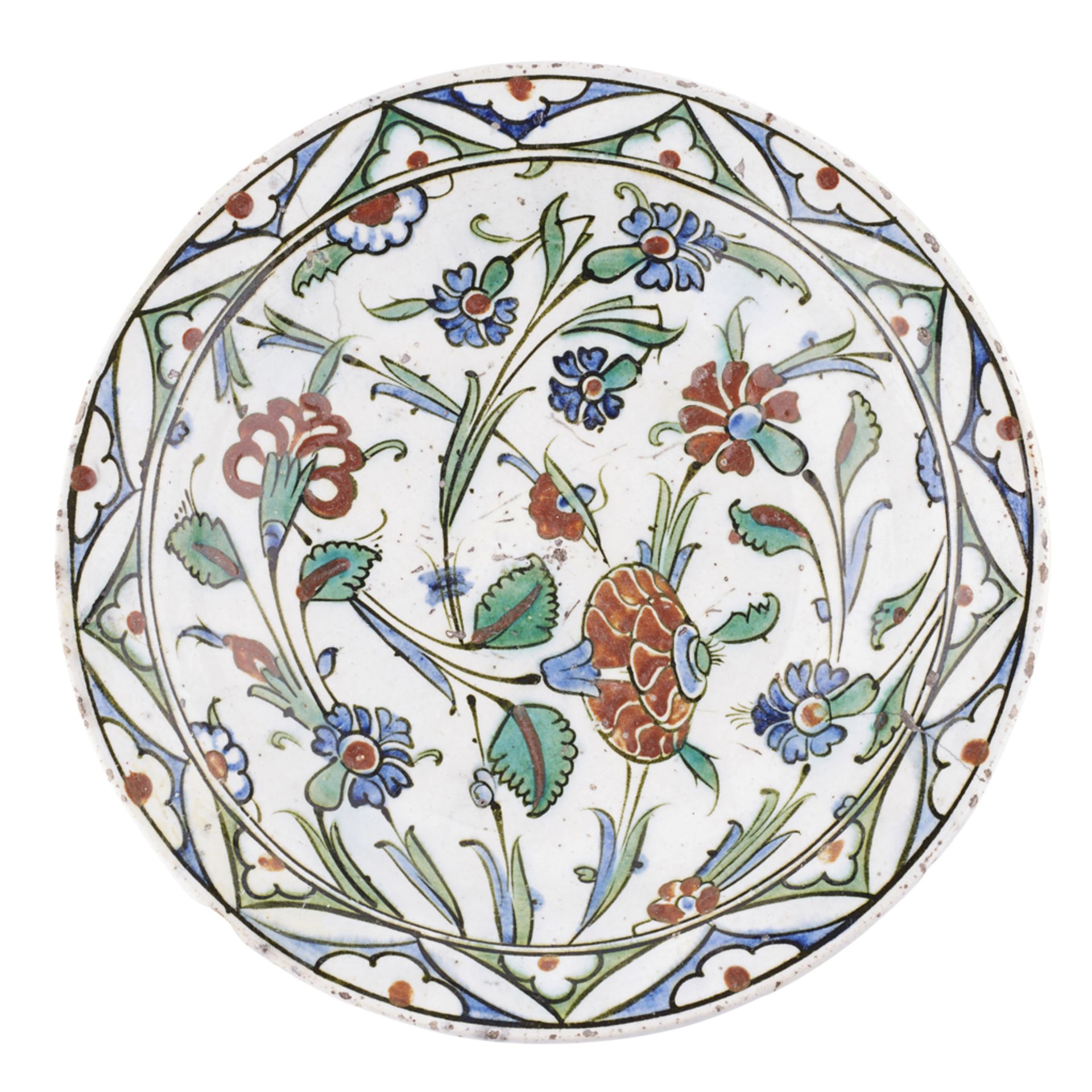 LARGE IZNIK UNDERGLAZE-PAINTED POTTERY DISH