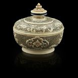 FINELY CARVED AND RETICULATED IVORY BOX AND COVERQING DYNASTY, 19TH CENTURY the sides of the box