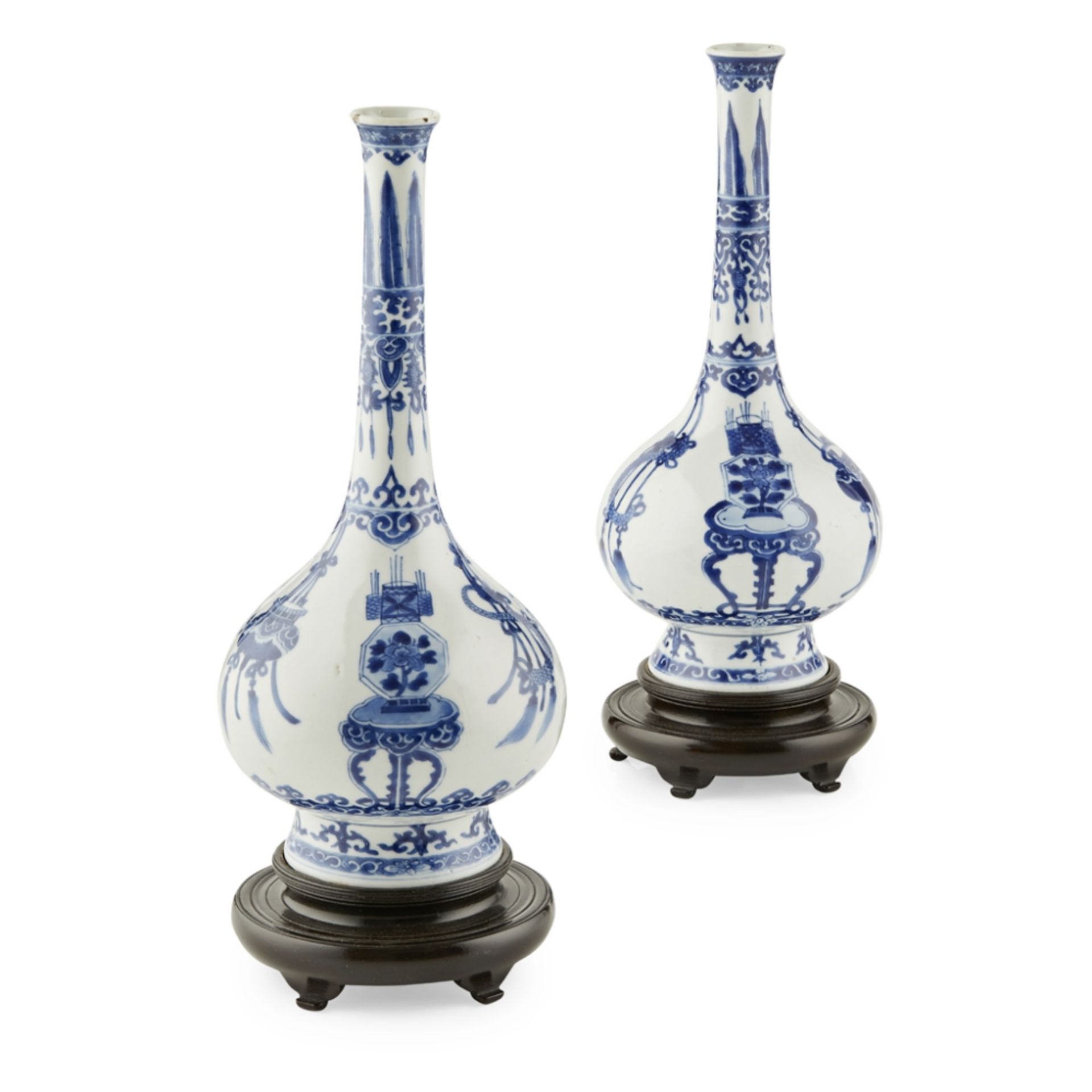 PAIR OF BLUE AND WHITE BOTTLE VASESKANGXI PERIOD each with a compressed pear-shaped body rising from