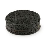 TORTOISESHELL CIRCULAR BOX AND COVERQING DYNASTY, 19TH CENTURY of circular form, the cover carved