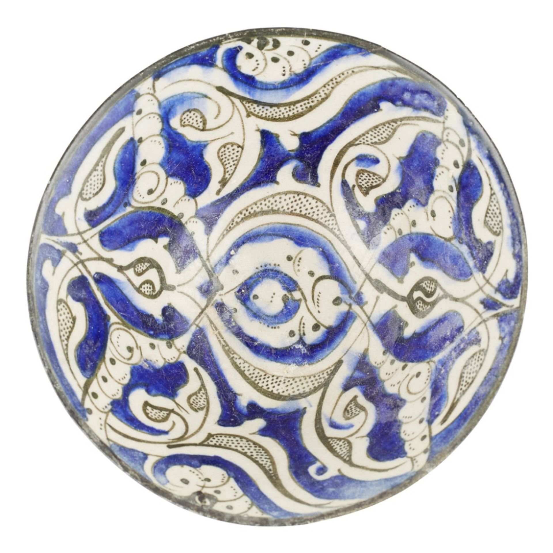 KASHAN BLUE AND WHITE UNDERGLAZE-PAINTED POTTERY BOWLPERSIA, 13TH CENTURY of conical form on a short