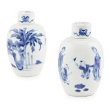 PAIR OF SMALL BLUE AND WHITE OVOID JARS AND COVERSKANGXI PERIOD each painted with two boys at