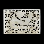 WHITE JADE PIERCED 'DRAGON' PLAQUELATE QING DYNASTY the rectangular plaque carved and pierced with a