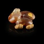 CARVED AGATE 'JUJUBE AND PEANUT' GROUPQING DYNASTY, 19TH CENTURY shaped as a squirrel perched atop