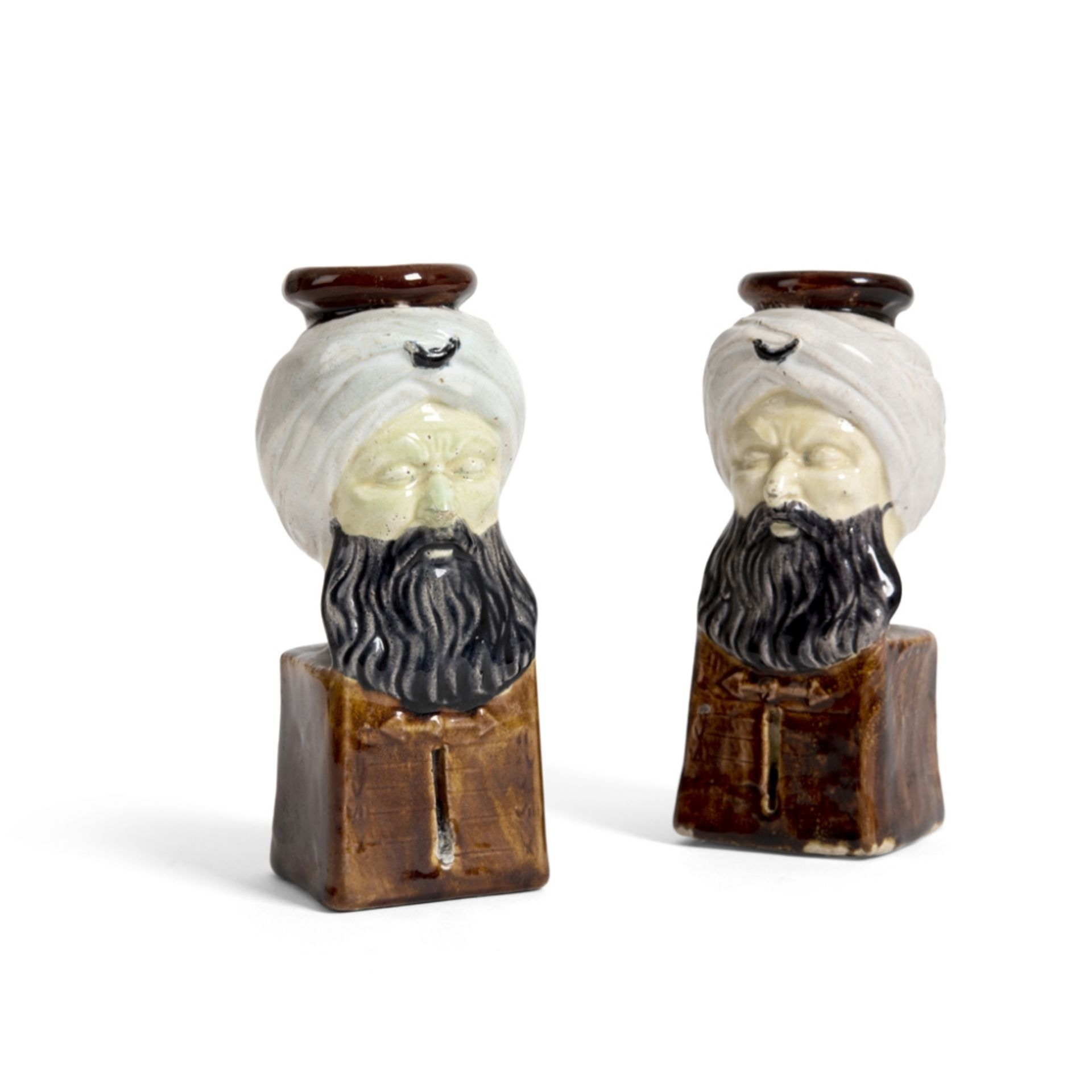 PAIR OF PORCELAIN CANDLE HOLDERSFRANCE MADE FOR THE TURKISH MARKET, 19TH CENTURY each in the form of