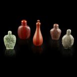 COLLECTION OF FIVE HARDSTONE SNUFF BOTTLES20TH CENTURY comprising: a rhodonite twin-mask-handle
